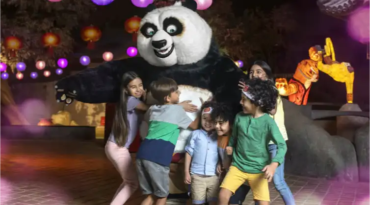 Image of children hugging Kung Fu Panda at Motiongate Theme Park Dubai