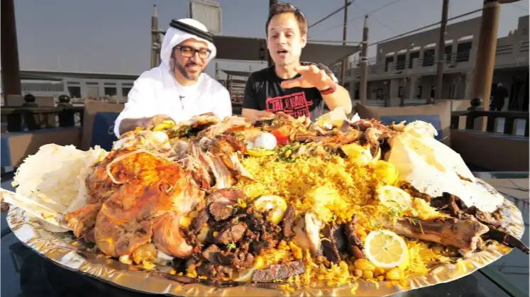 two men having a traditional Emirati meal