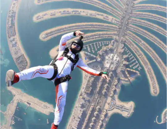 Image of a skydiver over Palm Jumeirah in Dubai